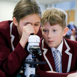 Students using a Microscope
